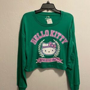Hello Kitty Athletic Department Junior’s Green Cropped Long Sleeve Graphic Tee